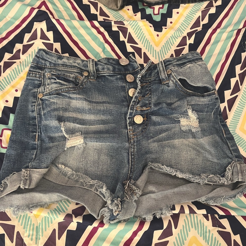 Two refuge jean shorts. US size 2. Blue. Medium wear, good condition.